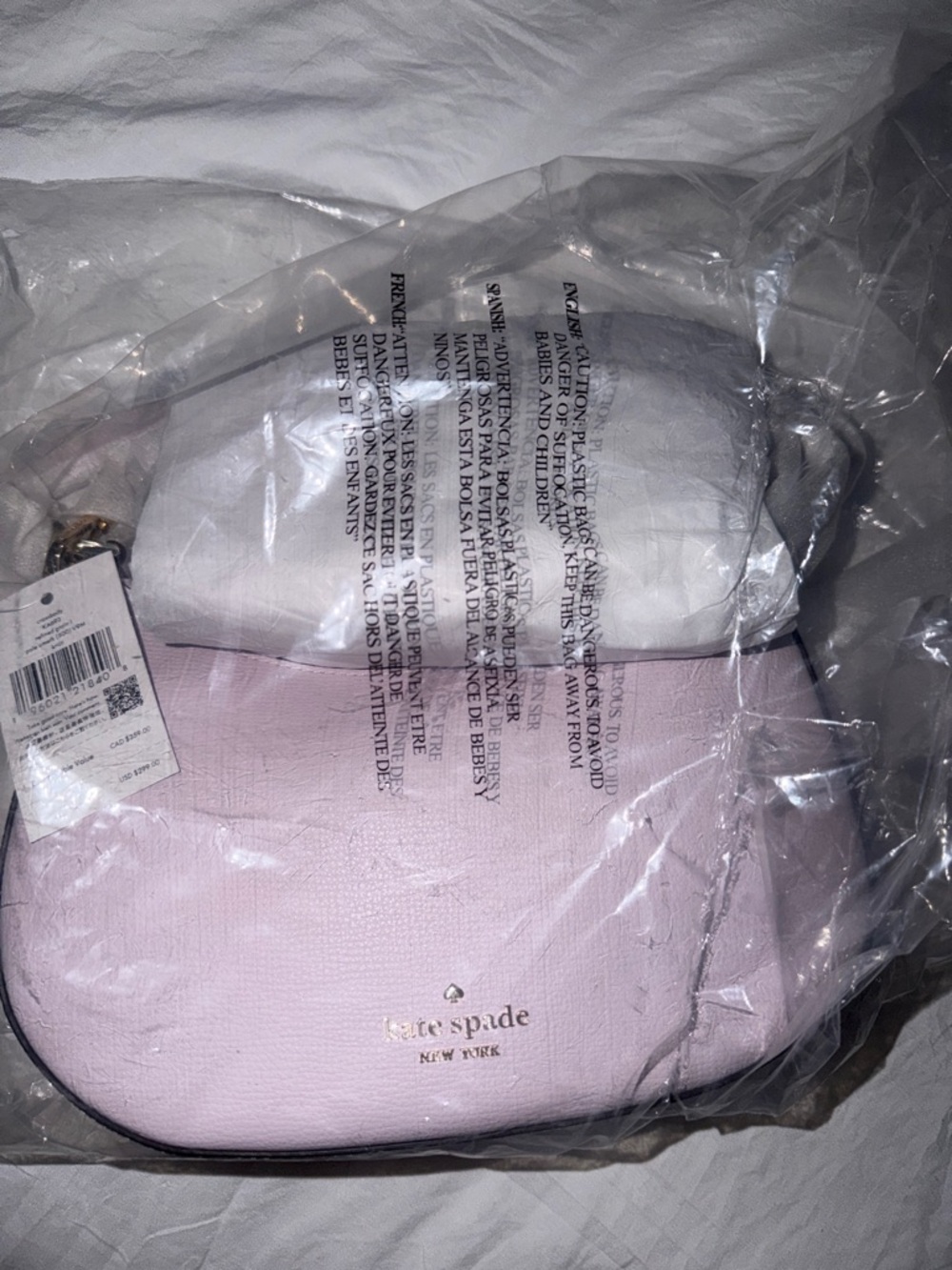 kate spade Light Pink Pebbled Leather Crossbody Bag with Gold Logo